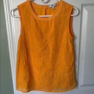 Yellow embroidered sleeveless blouse